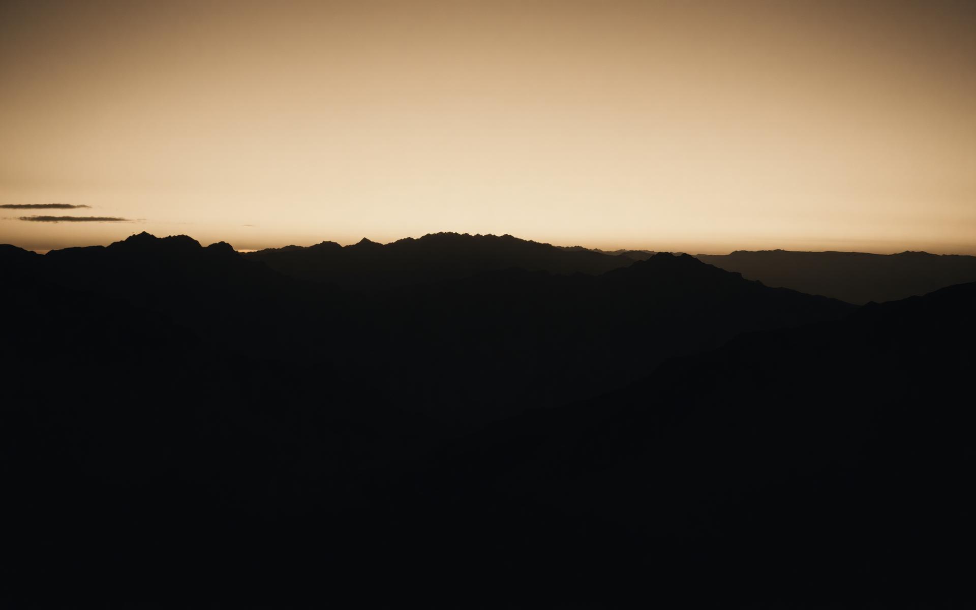 Distant mountain range at dawn